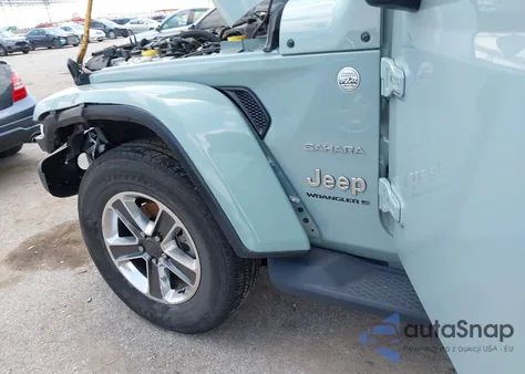 2023 Jeep Wrangler 4-Door Sahara 4X4 from USA, damaged, VIN 1C4HJXEN2PW601172